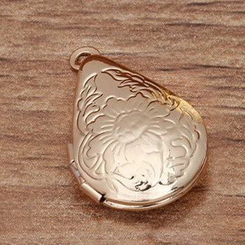Lovely Lockets - Small Teardrop - A tiny droplet shaped locket embossed with flowers, available in gold and silver.