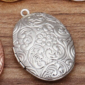 Lovely Lockets - Floral Oval- A medium sized oval locket embossed with flowers, available in several shades of gold and silver.