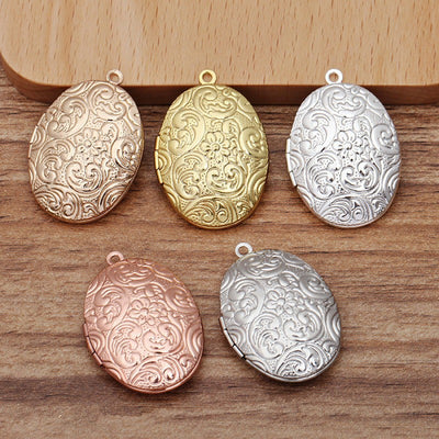 Lovely Lockets - Floral Oval- A medium sized oval locket embossed with flowers, available in several shades of gold and silver.