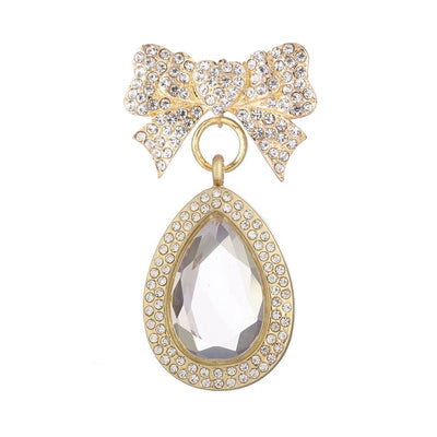 Melpomene Magnetic Brooch Locket - A crystal-encrusted brooch with a droplet shaped floating locket attached.