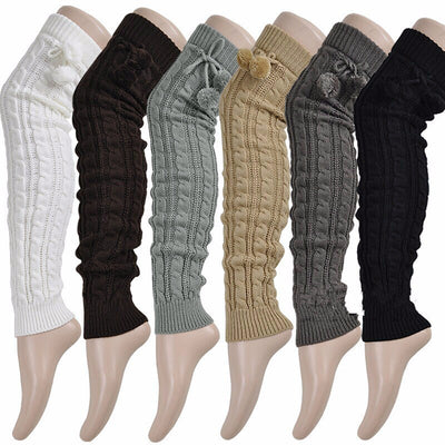The Snuggle Weather Leg Warmers - A pair of adorable knit over-knee leg warmers available in six snuggly winter colours: Blackout (black),  Hot Chocolate (dark brown), Tempest (dark grey), Overcast (light grey), Gingerbread (light brown), and Snowdrift (white).