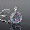 The Crystal Confetti Floating Locket - A lovely round pendant full of crystals!