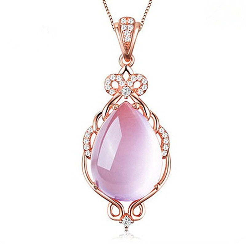 The Merope Necklace - A lovely delicate pink opal pendant studded with crystals. 