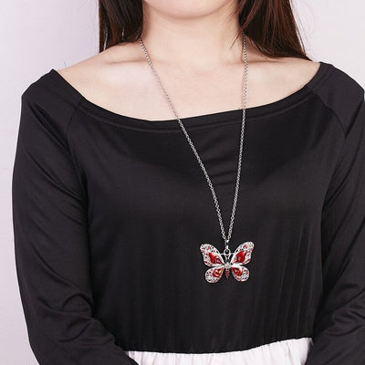The Cethosia Butterfly Necklace - Beautiful medium length silver coloured necklaces with butterfly pendants in blue, green, red, pink, purple, and honey orange gold.