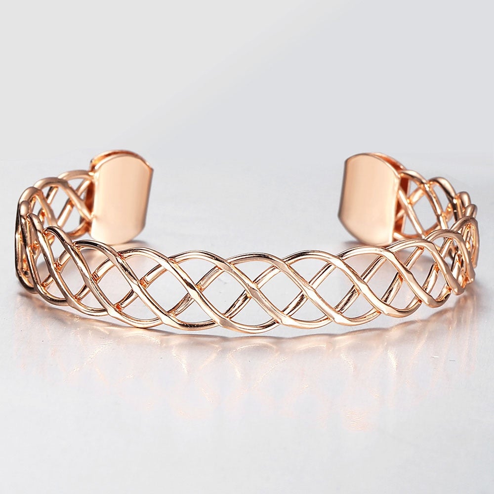 Celeste Woven Cuff Bracelet - A beautiful simple rose gold cuff that looks like plaited strands of wire. 