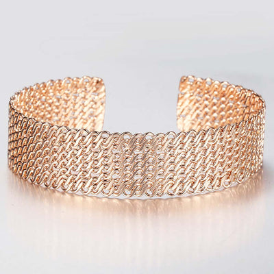 Petrina Woven Cuff Bracelet - A beautiful rose gold bangle that looks like it's made out of plaited or braided strands of gold.