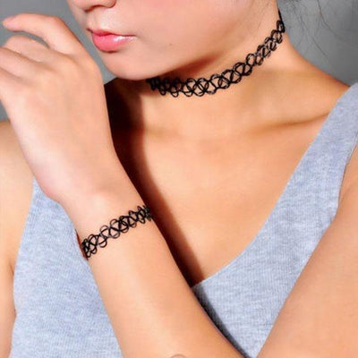Retro Revival - Fishline Tattoo Choker Singles - A photograph of a model wearing a fishline choker and bracelet.