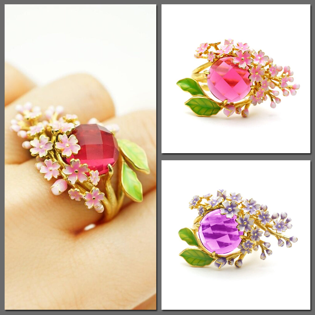 The Anthousai Ring - A lovely vibrant floral ring with a large coloured crystal surrounded by tiny enamel flowers and leaves. 