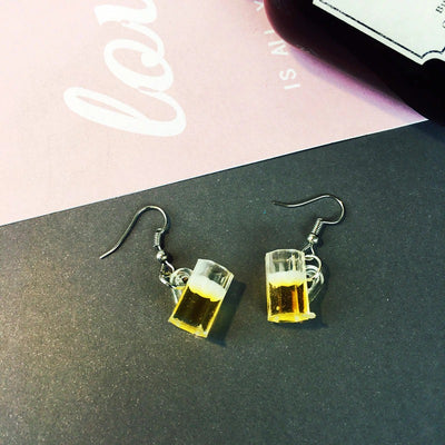 Teenytopia Pint-Sized Beer Mug Earrings - A pair of very tiny beer mugs on french hooks, designed to be worn as earrings. Available in a dark beer colour and a light beer colour.