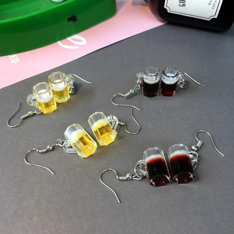 Teenytopia Pint-Sized Beer Mug Earrings - A pair of very tiny beer mugs on french hooks, designed to be worn as earrings. Available in a dark beer colour and a light beer colour.