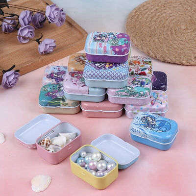 Teenytopia Trinket Tins - Marvellous Mermaids - Cute little metal tins adorned with colourful mermaid designs in an assortment of colours and styles.