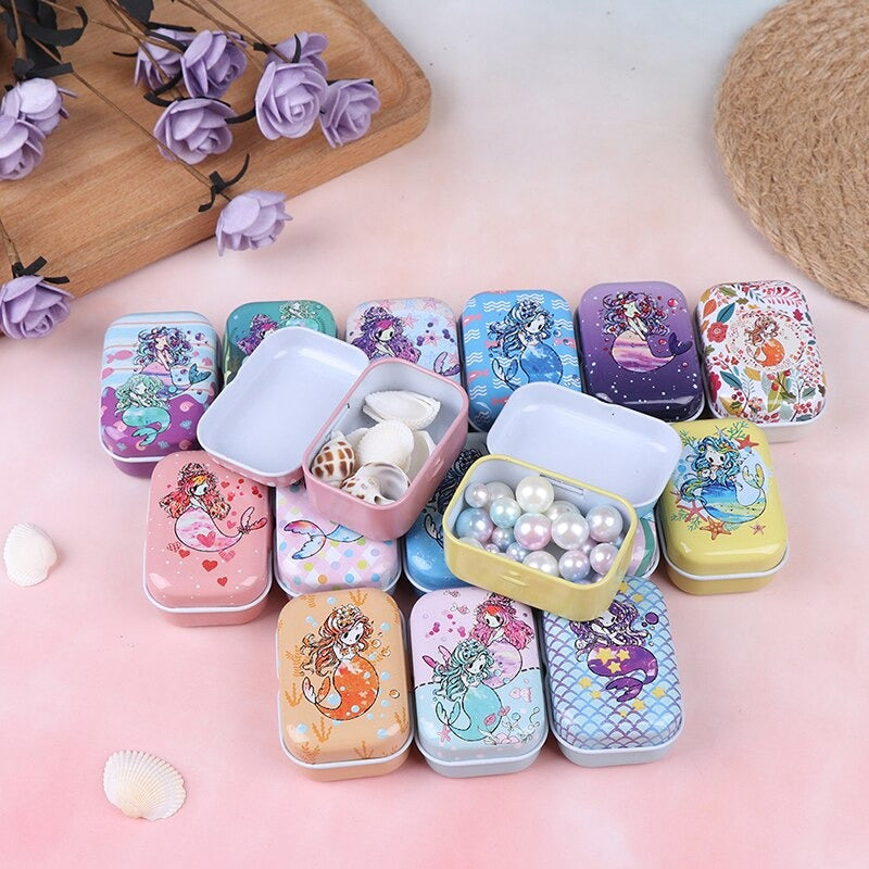 Teenytopia Trinket Tins - Marvellous Mermaids - Cute little metal tins adorned with colourful mermaid designs in an assortment of colours and styles.